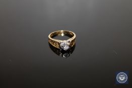 An 18ct gold diamond solitaire ring,