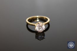A 14ct yellow gold diamond solitaire ring, the brilliant-cut stone of 1.