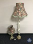 A brass and onyx standard lamp with shade together with similar table lamp