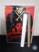 A rolled antiquarian map of Old Northumberland together with a roll of assorted posters and a