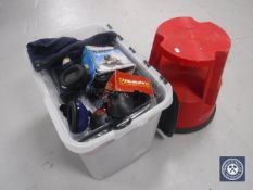 A box containing assorted work clothes,