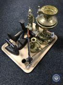 A tray containing assorted metal ware including brass figures of a viking and soldier, flat irons,