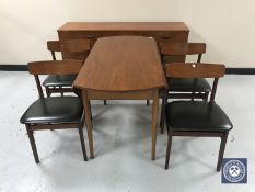 A six-piece mid 20th century teak dining room suite