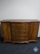 A mahogany Regency style breakfronted sideboard
