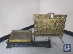 An antique cast iron fire curb,