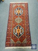 A Caucasian design runner on red ground,