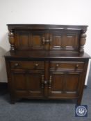 An oak court cupboard