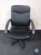 A swivel office armchair