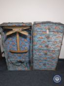 An early 20th century wardrobe trunk with shipping labels