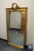 An ornate gilt mirror,