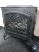 A contemporary electric fire in the form of a stove