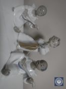 Three Lladro cherub musicians,