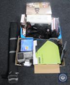 Two boxes containing halogen oven, books,
