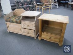 A stripped pine telephone table and a pine stand fitted a drawer