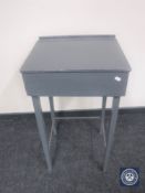 A mid twentieth century painted child's school desk