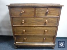 A Victorian mahogany five drawer chest