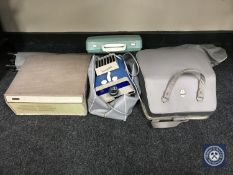 A portable typewriter together with Maxilite projector,