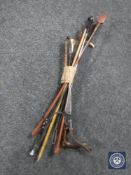 A quantity of riding crops and whips