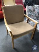 A late 20th century beech framed armchair