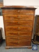 A 19th century mahogany seven drawer chest,