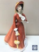 A Royal Doulton figure,