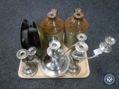 A tray of advertising flagons, brass scales,