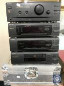 A Sony four piece separate system together with aluminium travel case and folding display stand.