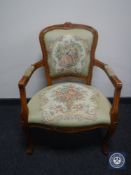 A continental salon armchair in tapestry fabric