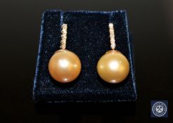 A pair of 14ct yellow gold pearl earrings,
