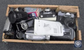 A large collection of cameras, video camera etc.