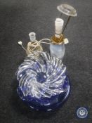 Three continental glass dishes together with two table lamps