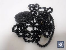 A small collection of Jet jewellery, necklaces, brooch etc.