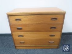 A mid 20th century teak four drawer chest