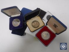 A collection of coins, commemorative crowns, Canadian dollar etc.