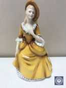A Royal Doulton figure,