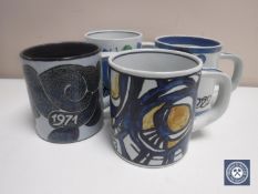 Four Royal Copenhagen Fajence tankards, height 11.