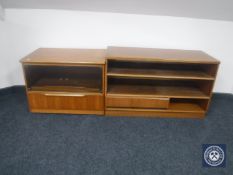 A late 20th century teak entertainment stand together with similar TV stand