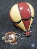 An ornamental hanging balloon ornament