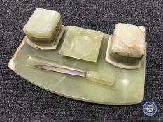 An onyx desk stand with letter opener and ashtray