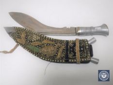An Eastern jambiya dagger set and one other dagger in sheath