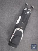 A Penn golf bag together with a set of Wilson clubs