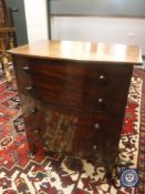 A 19th century mahogany bowfront step commode,