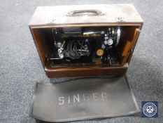 A Singer sewing machine in case
