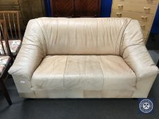 A 20th century brown leather settee