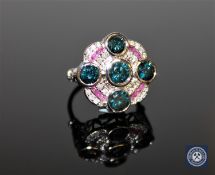 An 18ct white gold Art Deco style diamond and ruby ring, five brilliant-cut,