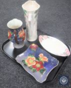 A tray of two pieces of Maling and two pieces of Royal Doulton.