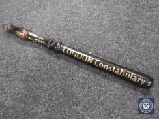 A wooden truncheon marked 'London Constabulary'