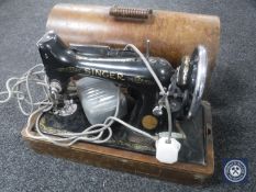 A Singer sewing machine in case