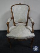 A continental salon armchair in floral fabric