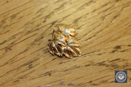 A 9ct gold cultured pearl leaf brooch CONDITION REPORT: 2.